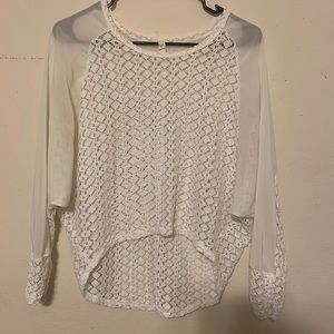 White cover up shirt.